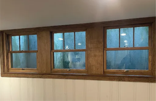 By material wood interior window.